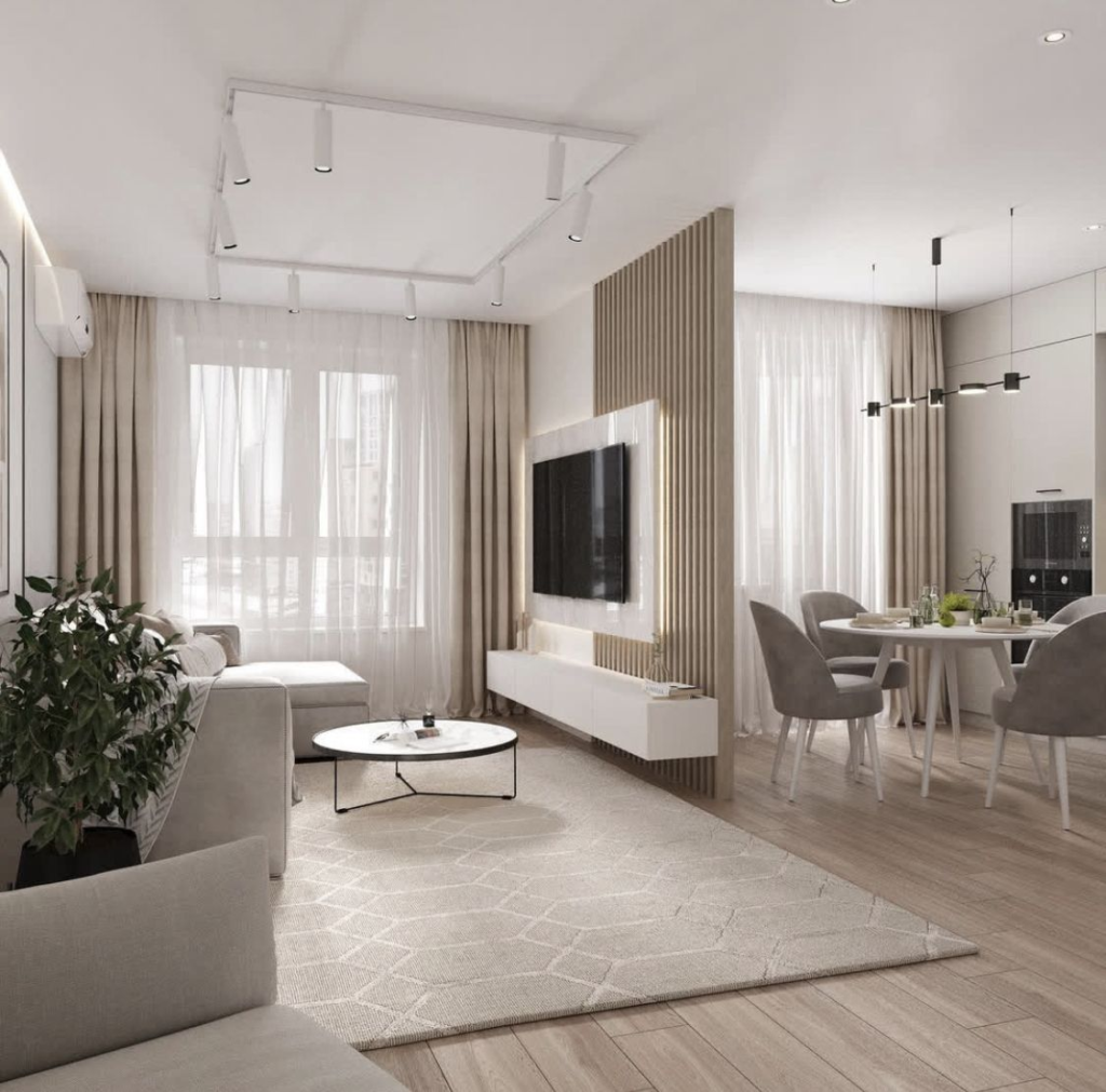 Trước là bức tường ngăn bếp và khách, sau là không gian mở với đảo bếp. cải tạo chung cư cũ